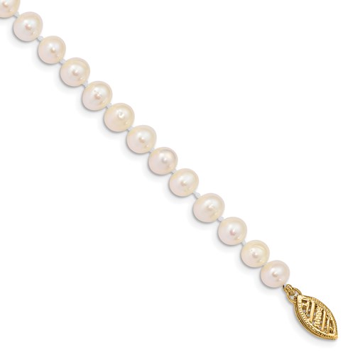 Leather and pearl bracelet from St Barth, triple rows of cultured pearls  and mother-of-pearl on leather, jewelry from St Barth island